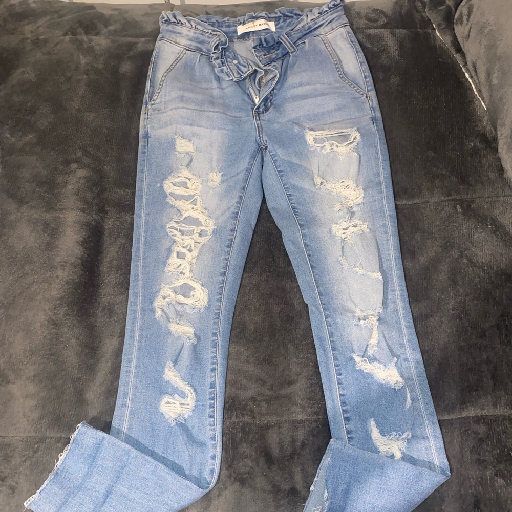 Ripped blue jeans